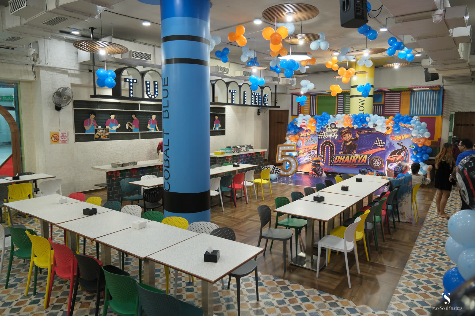 Birthday seating arranged before a personalised backdrop at Baccha Party Vashi
